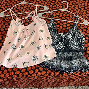 Used juniors tank tops, bundle of 2, print patterns. One has a tie front.